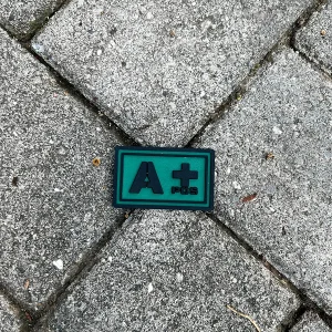 Parche RH A+ VERDE R2